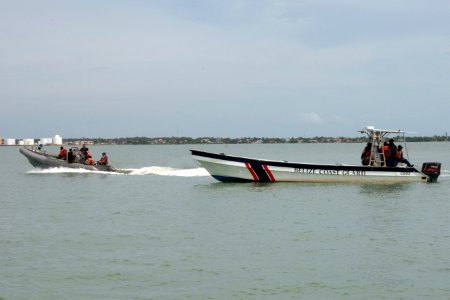 US Navy 070830-N-0989H-353 Members of the Belize Coast Guard conduct maneuvers with U.S. Navy trainers during a patrol craft operations course, as part of Global Fleet Station's pilot deployment to the Caribbean Basin and photo