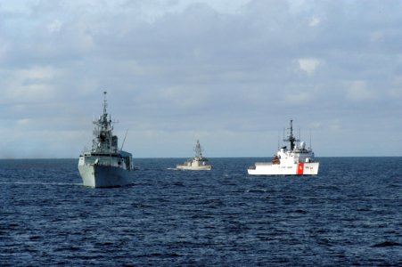 US Navy 070831-N-7029R-037 From left, Canadian ship HMCS Regina (FFH 334), Peruvian ship BAP Sanchez Carrion (CM 26) and U.S. Coast Guard Cutter USCGC Thetis (WMEC 910) steam in formation for a photo exercise during PANAMAX 200