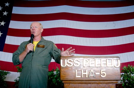 US Navy 070829-N-6410J-098 Adm. Robert F. Willard, commander of U.S. Pacific Fleet, addresses Pacific Partnership members aboard amphibious assault ship USS Peleliu (LHA 5) during an all hands call