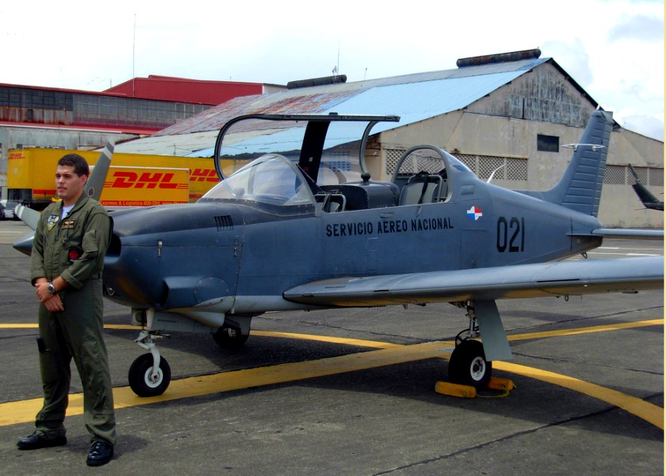 US Navy 070901-N-1713L-013 2nd Lt. Hanz Zimmermann, a Panamanian T-35 pilot, stands near his aircraft after returning to Tocumen International Airport from maritime surveillance as part of the Combined Forces Air Combatant Comm