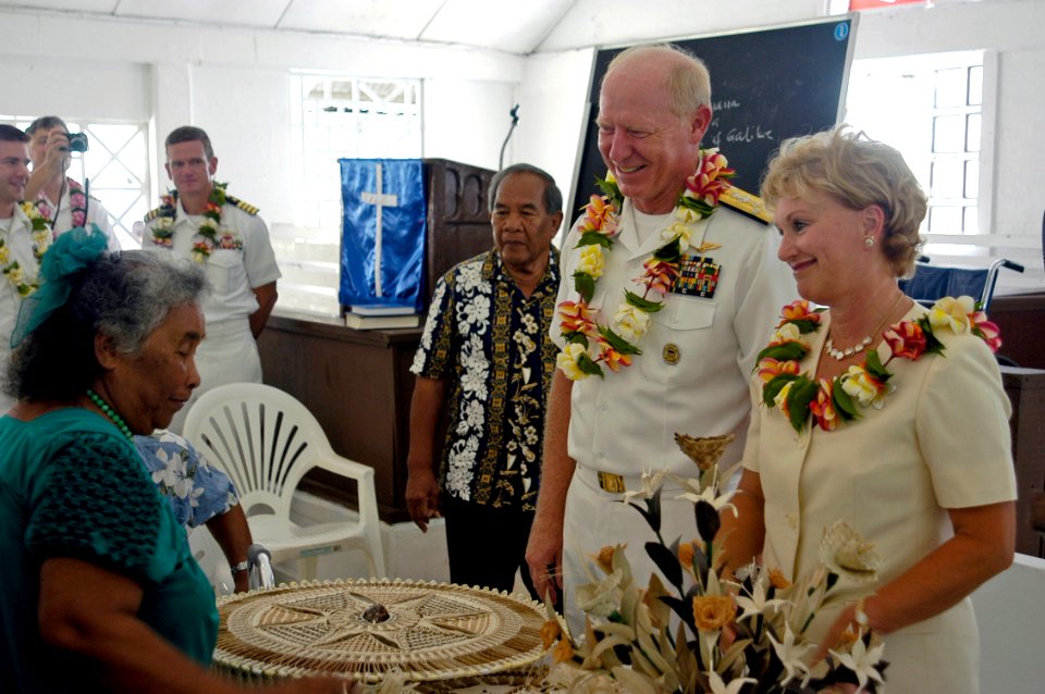 US Navy 070829-N-6410J-182 Commander, U.S. Pacific Fleet Adm. Robert F. Willard and wife Donna receive gifts from local citizens during a visit to a local church in Majuro