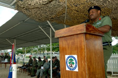 US Navy 070831-N-0989H-025 Brig. Gen. Lloyd Gillett, commander of the Belize Defense Force, addresses Belize soldiers and recruits during a ceremony marking the completion of small unit training with a U.S. Marine Corps mobile