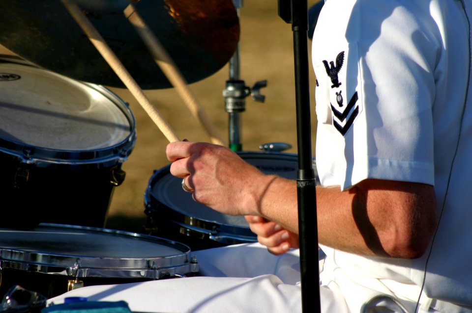 US Navy 070831-N-7163S-006 Musician 2nd Class Ted Moore, of Navy Band Great Lakes' rock band, Horizon, performs at Lakota East High School prior to the start of a football game between Lakota and Glen Este High
