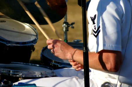 US Navy 070831-N-7163S-006 Musician 2nd Class Ted Moore, of Navy Band Great Lakes' rock band, Horizon, performs at Lakota East High School prior to the start of a football game between Lakota and Glen Este High