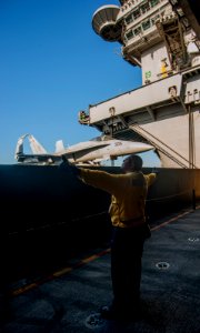 USS Carl Vinson aircraft elevator rises to the flight deck 141022-N-TP834-165