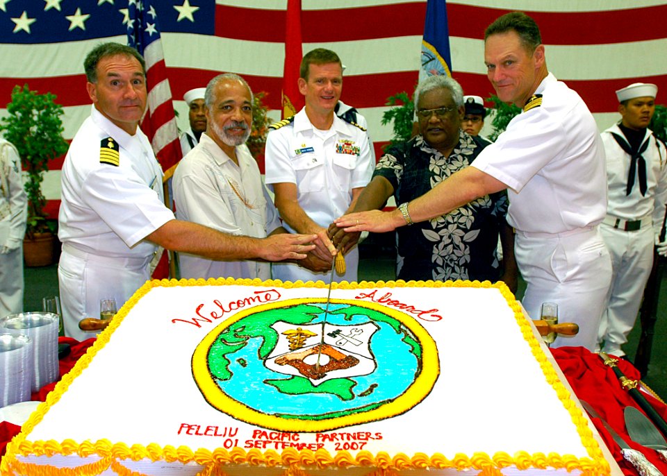 US Navy 070901-N-9421C-068 Pacific Partnership - Capt. Scott Flinn, Ambassador Clyde Bishop, Minister Witten T. Philippo, Capt. Bruce Stewart and Capt. Ed Rhoades on USS Peleliu