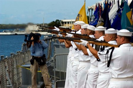 US Navy 070902-N-0995C-043 Naval honor guard members fire a rifle salute to commemorate the end of World War II in a ceremony held aboard the USS Missouri Memorial