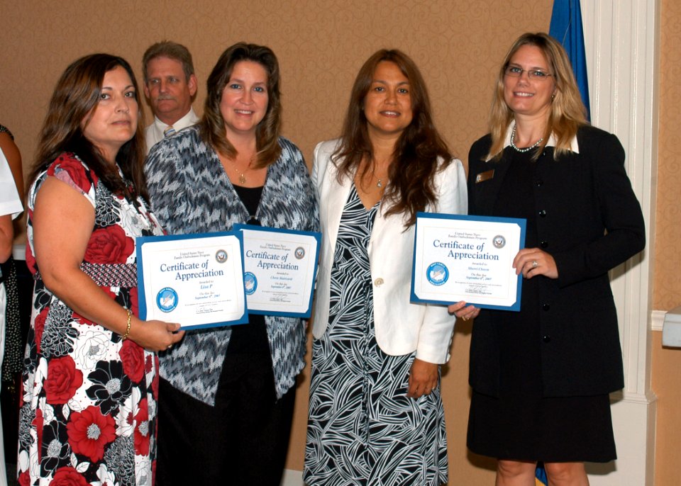 US Navy 070906-N-1522S-006 Mrs. Diana Campa, wife of Master Chief Petty Officer of the Navy (MCPON) Joe R. Campa Jr., presents certificates of appreciation to command ombudsmen at the Annual Ombudsman Appreciation Day Luncheon