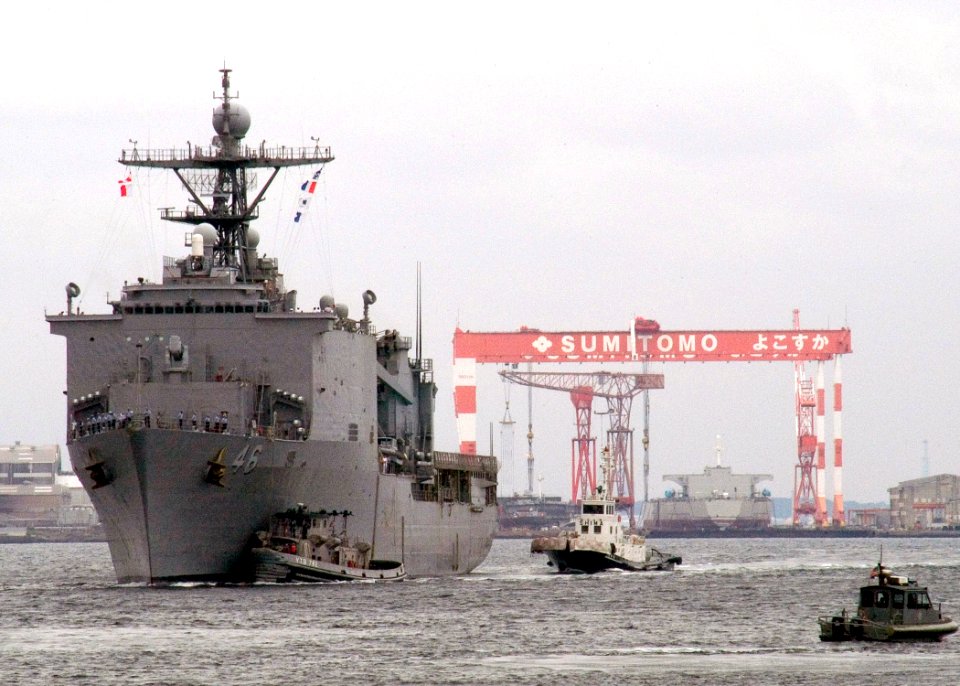 US Navy 070901-N-9520G-003 Harbor tugs assist dock landing ship USS Tortuga (LSD 46) as the ship enters port at Commander Fleet Activities Yokosuka with simulated Japanese evacuees as part of a Tokyo Metropolitan Government dis