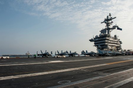 USS Carl Vinson assumes the watch from USS George H.W. Bush 141018-N-HD510-013