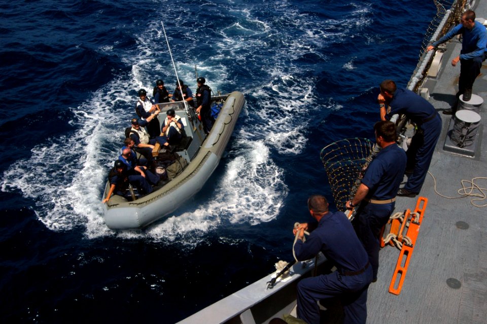 US Navy 070904-N-4014G-067 A rigid hull inflatable boat from guided missile destroyer USS James E. Williams (DDG 95) pulls alongside guided-missile destroyer USS Porter (DDG 78) for a personnel transfer