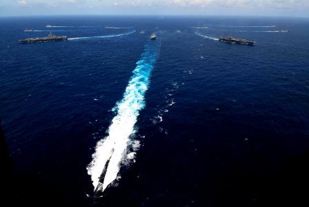 US Navy 070905-N-6106R-377 Naval ships from India, Australia, Japan, Singapore, and the United States break away after a joint photo exercise during Exercise Malabar 07-2