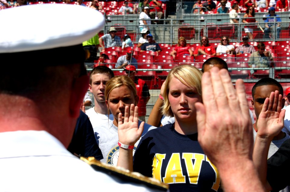 US Navy 070903-N-7163S-001 U.S. Joint Forces Command Chief of Staff and Cincinnati native, Rear Adm. Ben Wachendorf, enlists 16 Delayed Entry Program Personnel of the Greater Cincinnati area