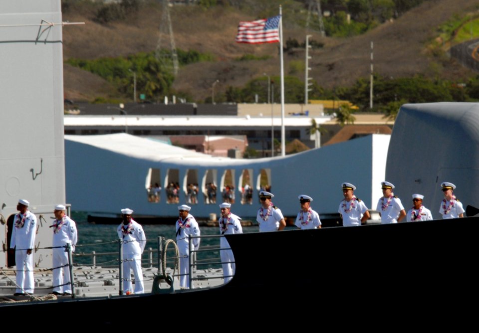 US Navy 070904-N-4965F-004 Sailors assigned to Ticonderoga-class guided-missile cruiser USS Lake Erie (CG 70) man the rails as they pass the USS Arizona Memorial while making their way pierside to Naval Station Pearl Harbor