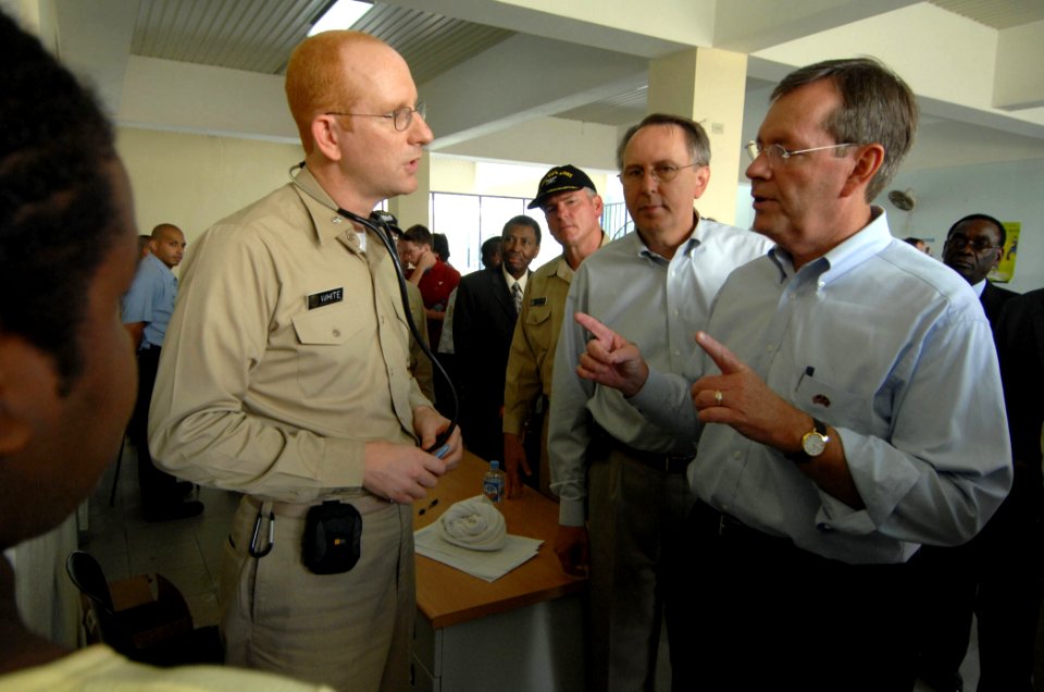 US Navy 070907-N-0194K-166 From right) Secretary of Health and Human Services Michael Leavitt speaks with U.S. Public Health Service Cmdr. Thomas White during his tour of the Military Sealift Command hospital ship USNS Comfort