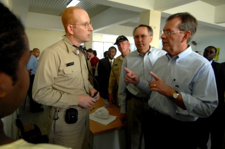 US Navy 070907-N-0194K-166 From right) Secretary of Health and Human Services Michael Leavitt speaks with U.S. Public Health Service Cmdr. Thomas White during his tour of the Military Sealift Command hospital ship USNS Comfort
