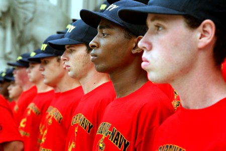 US Navy 070906-N-3271W-001 Members of the 49th Cardinal Company, a group of enlisted recruits from Navy Recruiting District St. Louis, prepare for their oath of enlistment photo