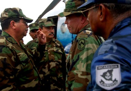 US Navy 070907-N-1810F-235 Lt. Col. Robert Gaddis meets with Nicaraguan Military during a humanitarian relief operation in Puerto Cabezas photo