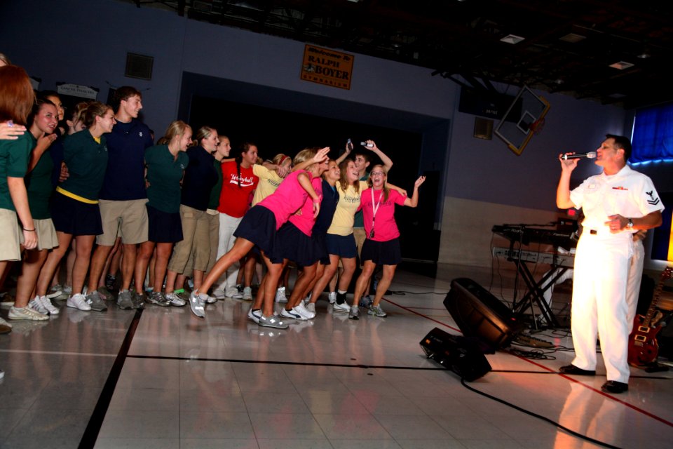 US Navy 070905-N-3271W-001 Musician 2nd Class Kenny Ray Horton and the U.S. Navy Rock Band, Freedom, perform at Saint Pius X High School during St. Louis Navy Week, Aug. 28 through Sept. 6