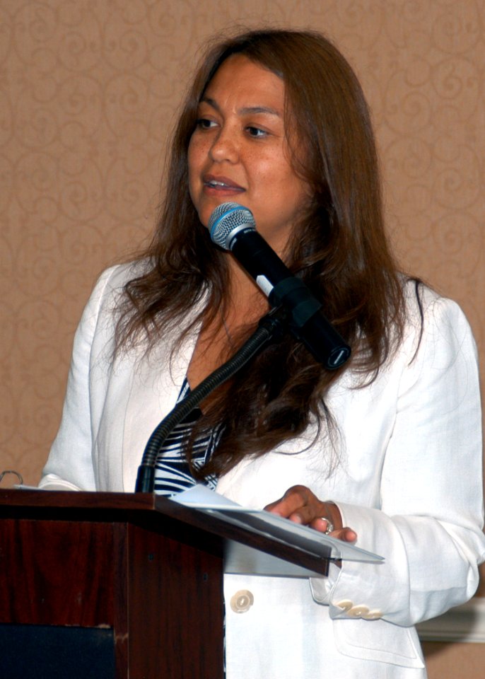 US Navy 070906-N-1522S-002 Mrs. Diana Campa, wife of Master Chief Petty Officer of the Navy (MCPON) Joe R. Campa Jr., offers words of admiration to command ombudsmen assigned to Naval Station Mayport photo