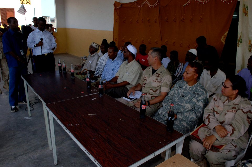 US Navy 070906-N-3931M-064 A local official addresses a speech to teachers, students, and personnel from Combined Joint Task Force-Horn of Africa (CJTF-HOA) during a school dedication ceremony