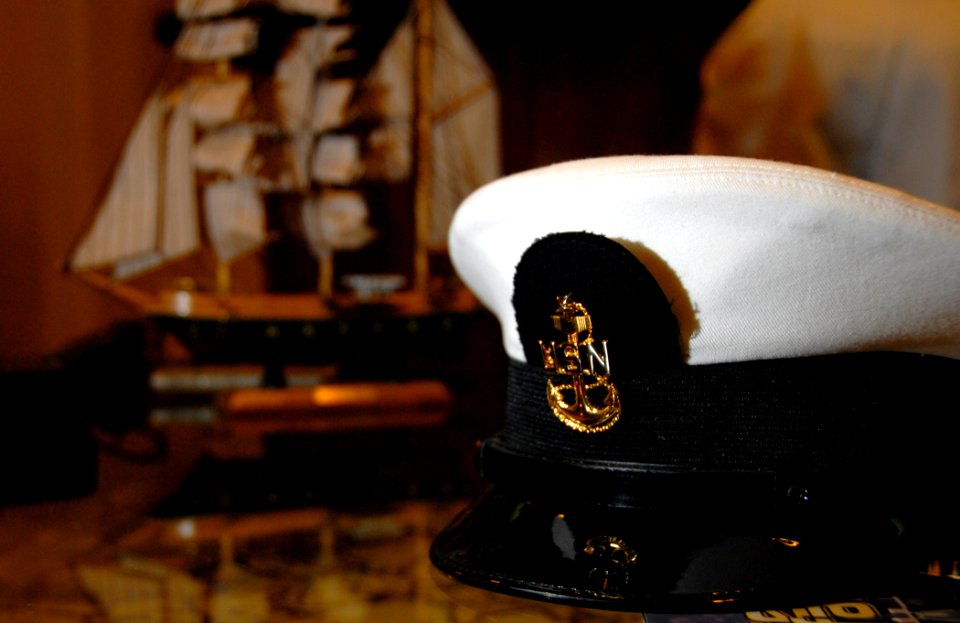 US Navy 070907-N-4965F-009 A U.S. Navy senior chief petty officer's cover, in Naval Station Pearl Harbor's Silver Dolphin Bistro, reminds visitors of Navy values and purpose