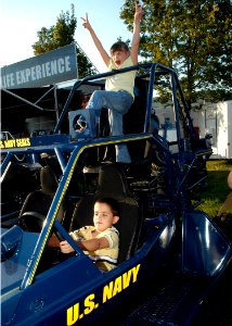 US Navy 070906-N-5208T-004 Youngsters at the Utah State Fair get a close-up look at a U.S. Navy Desert Patrol Vehicle (DPV)