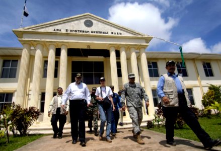 US Navy 070908-N-1810F-760 Paul A. Triveili, U.S. Ambassador to Nicaragua, foreground left, leaves government offices after meeting U.S. military personnel participating in Hurricane Felix disaster relief operations