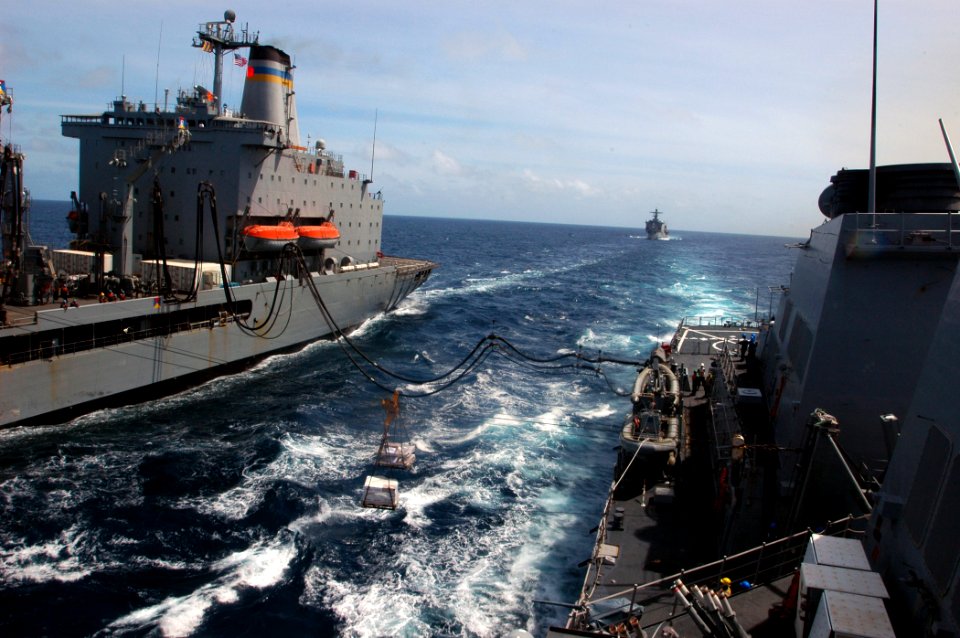 US Navy 070907-N-4014G-143 Guided-missile destroyer USS Porter (DDG 78) conducts an underway replenishment with Military Sealift Command fleet replenishment oiler USNS Leroy Grumman (T-AO 195)