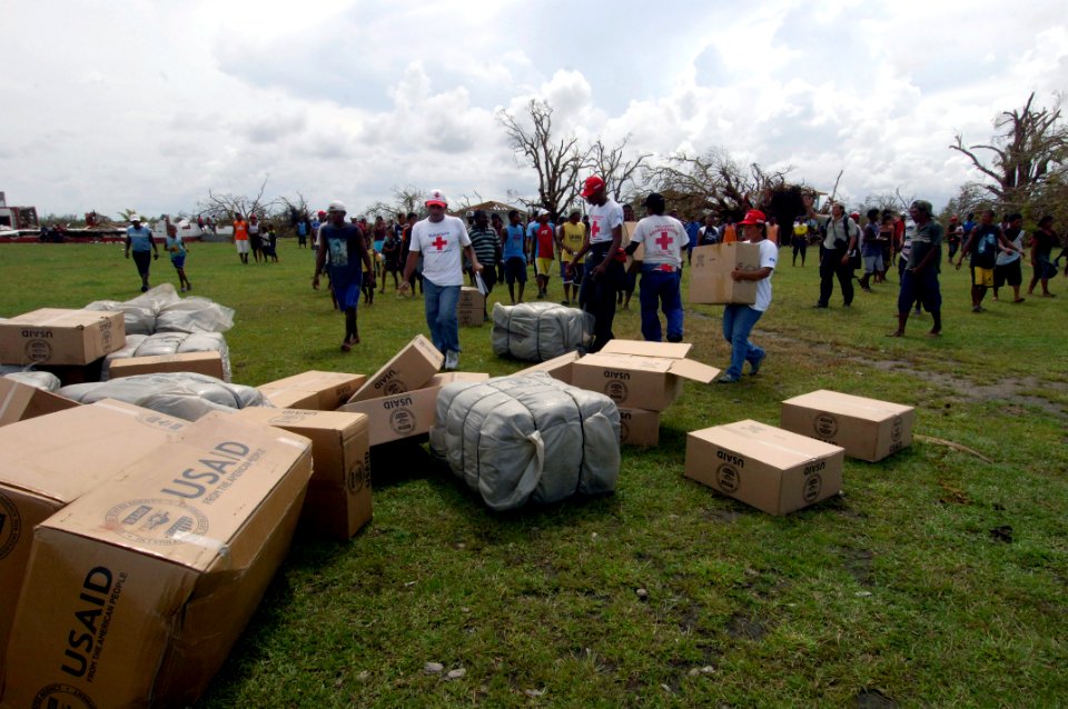 US Navy 070907-N-1810F-046 A large group of Nicaraguans arrive to carry away boxes of Meals Ready-to-Eat (MREs) that were delivered by Sailors attached to multi-purpose amphibious assault ship USS Wasp (LHD 1)