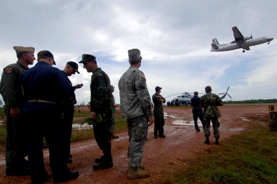 US Navy 070907-N-1810F-010 U.S. Army and Navy officers participating in Hurricane Felix relief efforts plan the delivery of supplies to