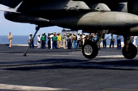 US Navy 070907-N-7883G-073 Press and distinguished visitors observe flight operations aboard USS Kitty Hawk (CV 63)