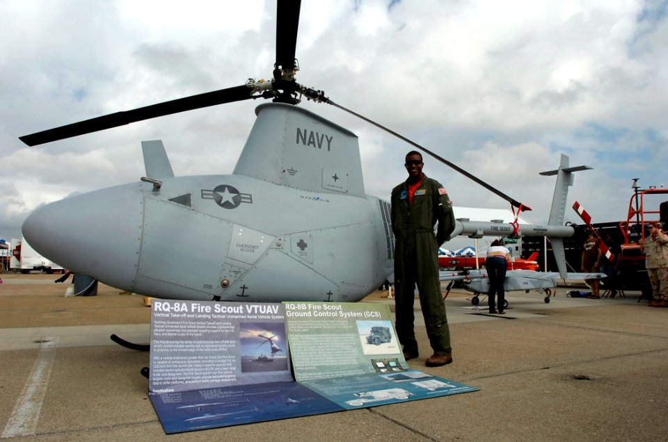 US Navy 070909-N-6676S-239 Lt. Kyle Matthew, of Fleet Composite Squadron (VC) 6, exhibits an RQ-8A Fire Scout Vertical Take-off and Landing Tactical Unmanned Aerial Vehicle System at the 2007 Naval Air Station Oceana Air Show