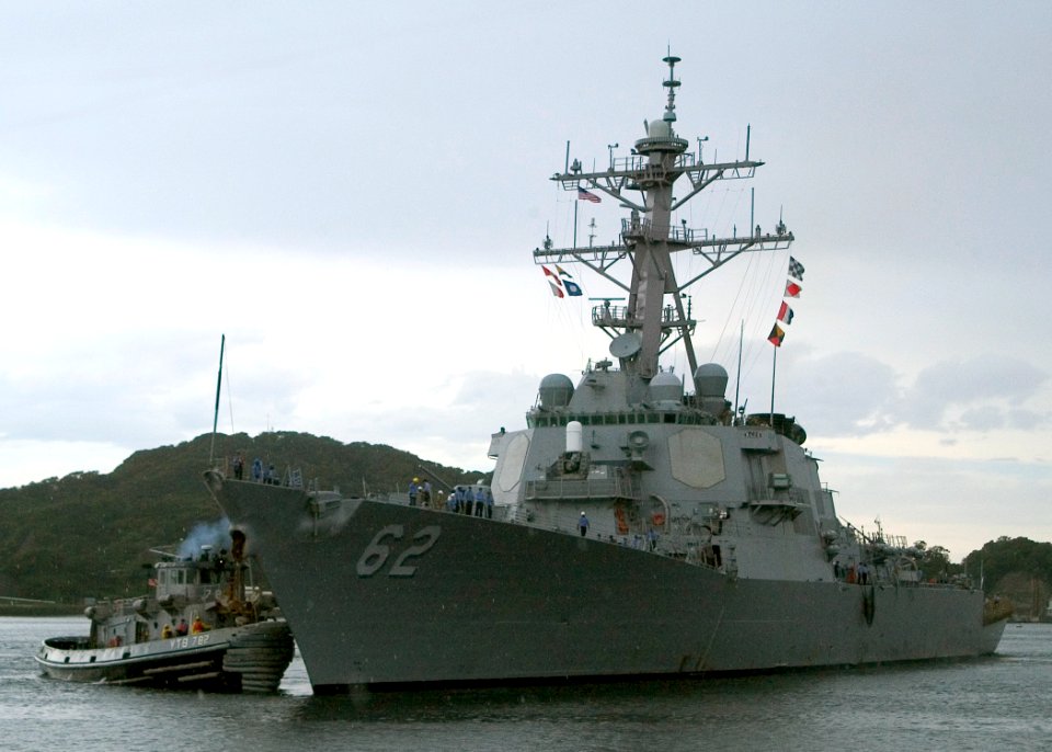 US Navy 070910-N-0483B-001 Large harbor tug Manistee (YTB 782) assists Arleigh Burke-class guided-missile destroyer USS Fitzgerald (DDG 62) into Commander Fleet Activities Yokosuka