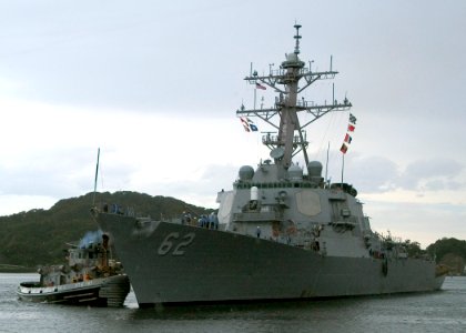 US Navy 070910-N-0483B-001 Large harbor tug Manistee (YTB 782) assists Arleigh Burke-class guided-missile destroyer USS Fitzgerald (DDG 62) into Commander Fleet Activities Yokosuka