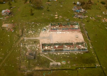 US Navy 070907-N-1189B-215 An aerial view shows the devastation of one of the larger buildings in Nicaragua after Hurricane Felix slammed into the country photo