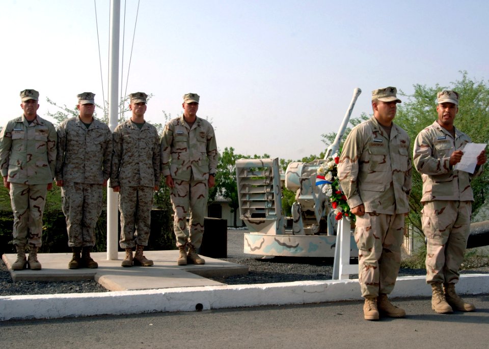US Navy 070911-N-3285B-138 Members of the color guard stand by as Electronics Technician 1st Class Arcenet Vazquez shares a few words after presenting a wreath in remembrance of the sixth anniversary of the Sept. 11 terrorist a