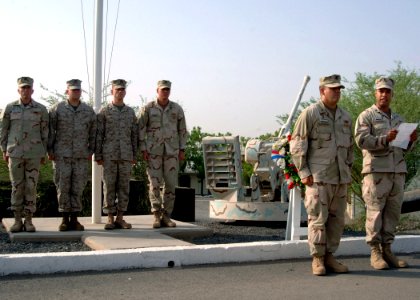 US Navy 070911-N-3285B-138 Members of the color guard stand by as Electronics Technician 1st Class Arcenet Vazquez shares a few words after presenting a wreath in remembrance of the sixth anniversary of the Sept. 11 terrorist a photo