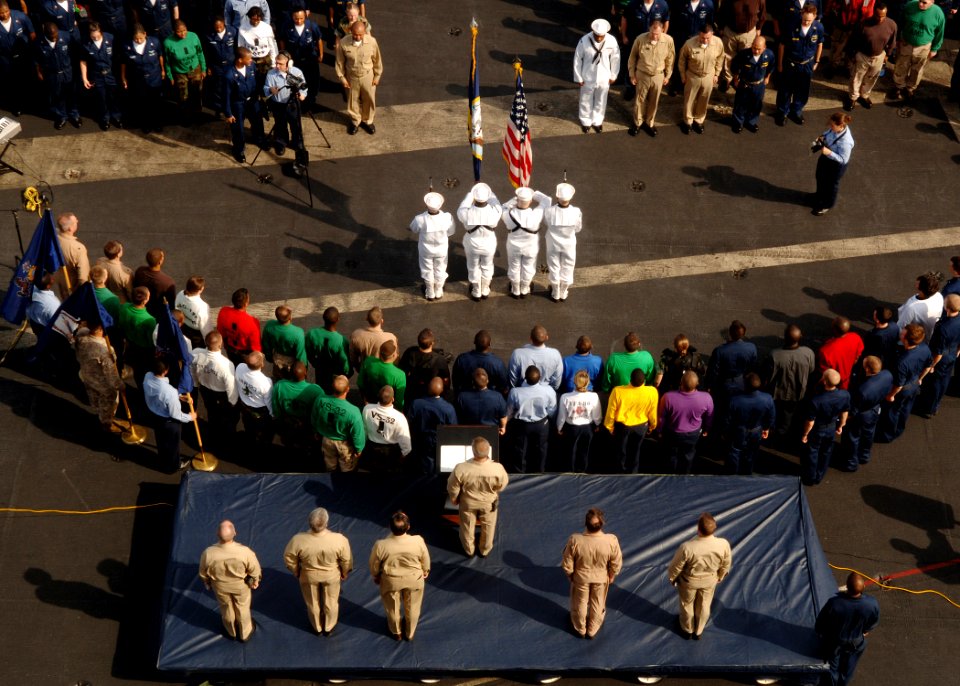 US Navy 070911-N-5928K-001 The colors are paraded during a Sept. 11 commemoration ceremony on the flight deck of nuclear-powered aircraft carrier USS Enterprise (CVN 65)