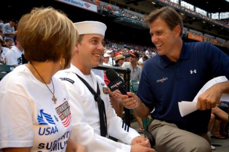 US Navy 070909-N-5319A-011 Fire Controlman 1st Class John Michael Broughton is interviewed at Camden Yards during a game between the Baltimore Orioles and the Boston Red Sox