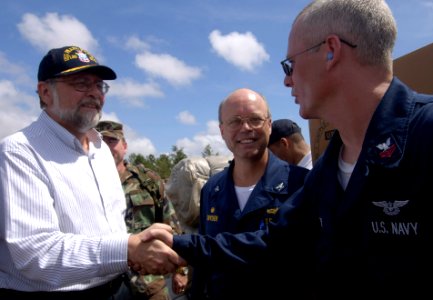 US Navy 070908-N-1810F-428 Paul A. Triveili, U.S. Ambassador to Nicaragua, left, is introduced to a Sailor from amphibious assault ship USS Wasp (LHD 1) photo