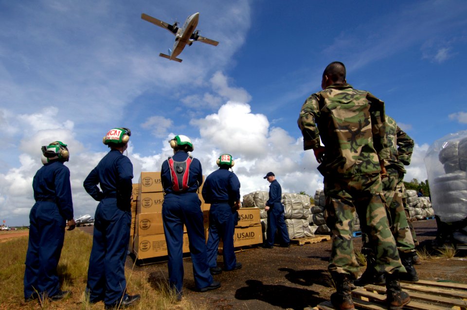 US Navy 070908-N-1810F-172 Nicaraguan soldiers and U.S. Navy Sailors combine efforts to deliver disaster relief supplies to Nicaraguans hit by Hurricane Felix