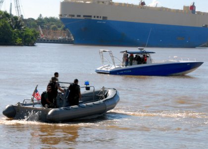 US Navy 070911-N-9486C-004 Patrol Craft Operations course instructors conduct maneuvers with Port Security forces from the Dominican Republic photo