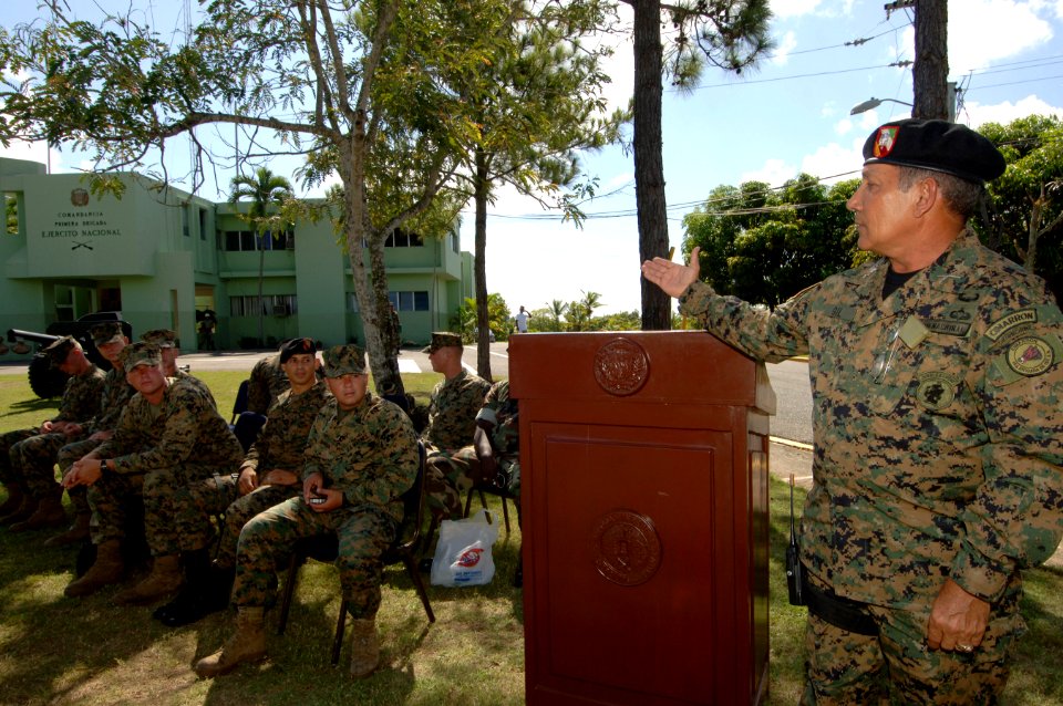 US Navy 070914-N-0989H-061 Brig. Gen. Francisco Jose Gil Ramirez, commandant of 1st Infantry Brigade, Dominican Defense Force, thanks U.S. Marines from a mobile training team who conducted small unit training with members of th