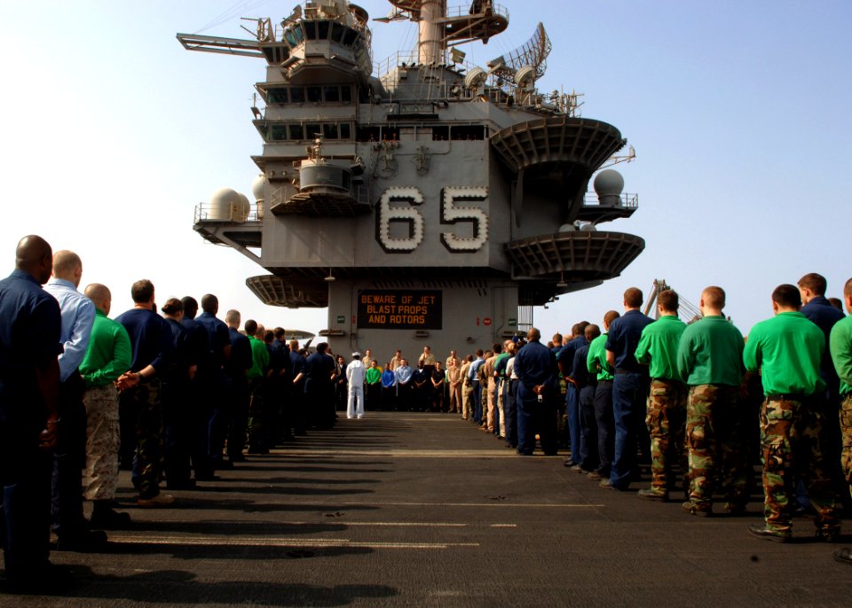 US Navy 070911-N-5928K-004 Sailors conduct a Sept. 11 commemoration ceremony on the flight deck of nuclear-powered aircraft carrier USS Enterprise (CVN 65)