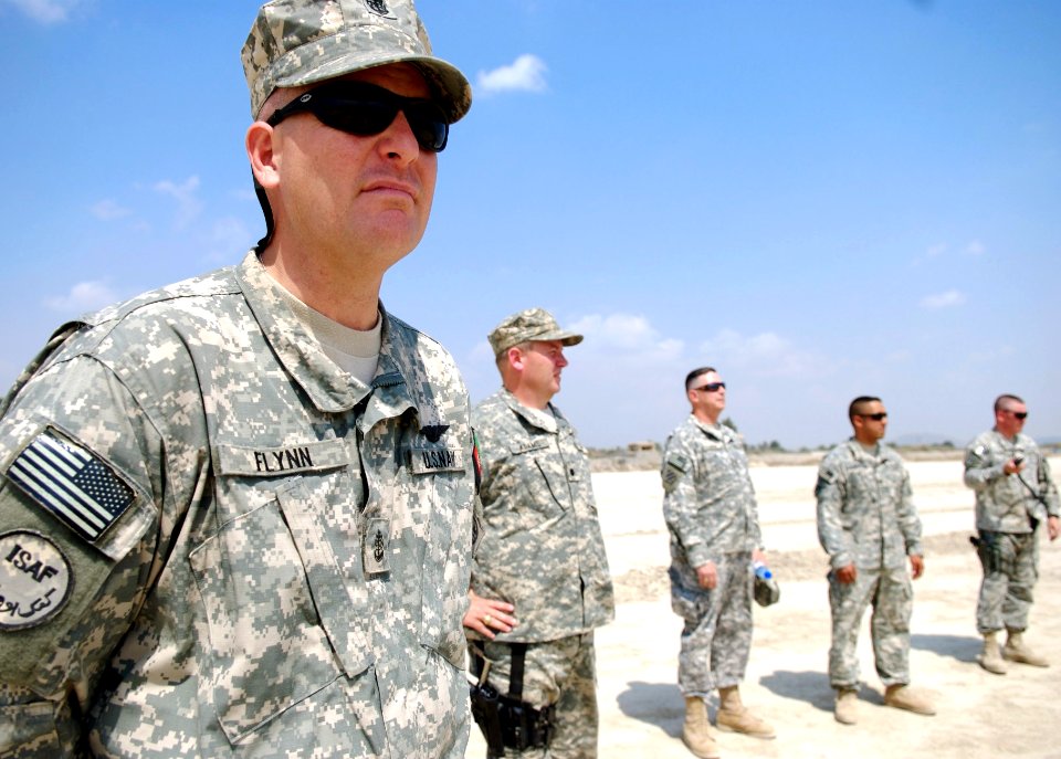 US Navy 070916-N-3385W-428 Chief Petty Officer Flynn, a senior enlisted advisor for Provincial Reconstruction Team Khost, watches as Sgt. Maj. of the Army Kenneth Preston departs after a brief visit to the team