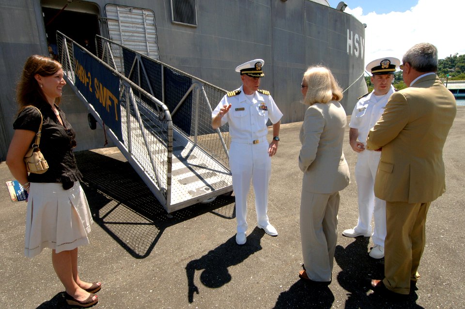 US Navy 070918-N-0989H-016 Capt. Douglas Wied, commander of Task Group 40.9, greets the Honorable Brenda LaGrange Johnson, U.S. Ambassador to Jamaica, and her guest upon their arrival to the Boundbrook Wharf