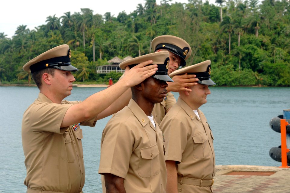 US Navy 070921-N-0989H-054 Chief Hospital Corpsman Paul Sexton and Chief Electrician's Mate Peter Nuako receive their chief petty officer covers
