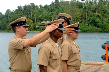 US Navy 070921-N-0989H-054 Chief Hospital Corpsman Paul Sexton and Chief Electrician's Mate Peter Nuako receive their chief petty officer covers photo