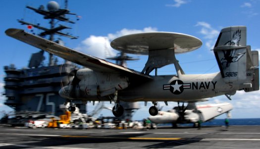 US Navy 070917-N-8923M-001 An E-2C Hawkeye, attached to the Seahawks of Carrier Airborne Early Warning Squadron (VAW) 126, prepares to make an arrested recovery aboard Nimitz-class aircraft carrier USS Harry S. Truman (CVN 75)